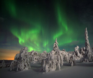 viaje a laponia auroras boreales paisaje nevado